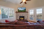 Living Area with Stone Fireplace with Gas Logs